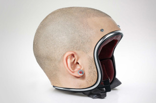 A Collection Of Helmets That Look Like Real Human Heads