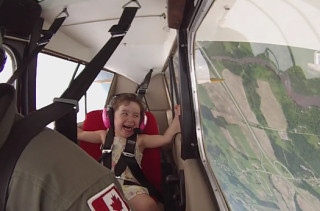 Watch This Little Girl Squeal With Delight While Riding In Her Daddy's Stunt Plane... So Cute!