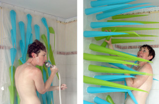 This Inflatable Spiked Shower Curtain Prevents Long Showers