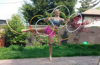 Watch This Girl Spin 9 Hula Hoops On Her Body At The Same Time!